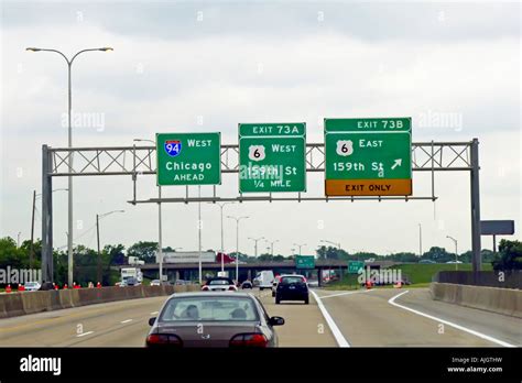 Overhead Traffic route signs on the expressway heading towards Stock Photo: 14734932 - Alamy