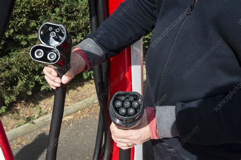 Electric car charging cables - Stock Image - C051/2100 - Science Photo Library