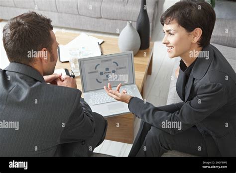 Business people with laptop Stock Photo - Alamy