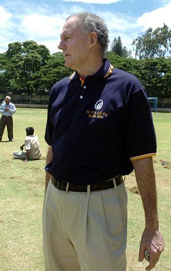 Greg Chappell inspects the ground at the Academy in Bangalore ...