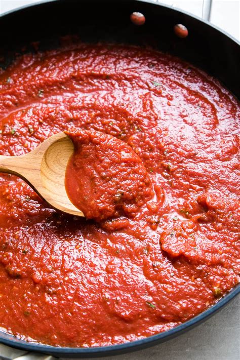 This Marinara Sauce recipe is an easy to make vegan tomato sauce perfect for topping on your ...