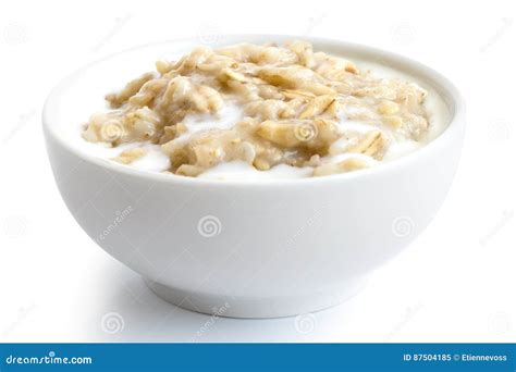 Cooked Whole Porridge Oats with Milk in White Ceramic Bowl Isolated on White. Stock Image ...