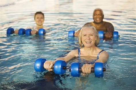 Seniors Exercising With Weights | San Antonio Pool Builder