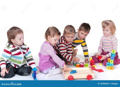 Five children playing toys stock photo. Image of emotion - 18396664