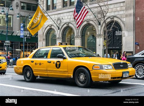 Yellow taxi cab, Fifth Avenue, Manhattan, New York, USA Stock Photo - Alamy