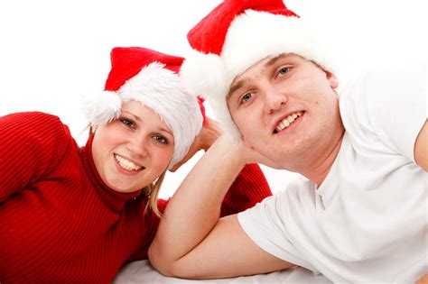 Couple In Santa Hats Free Stock Photo - Public Domain Pictures