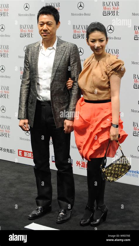 Chinese actor Zhang Fengyi, left, and actress Huang Yi arrive for an ...