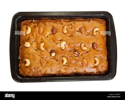 fresh honey cake with nuts. Isolated over white Stock Photo - Alamy