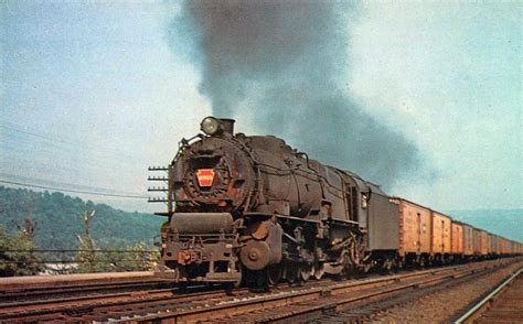 Pennsylvania Railroad 4-8-2 #6903 (M-1) hustles a hotshot freight of ...