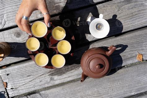 Tea ceremony, Woman pouring traditionally prepared tea 11755051 Stock ...