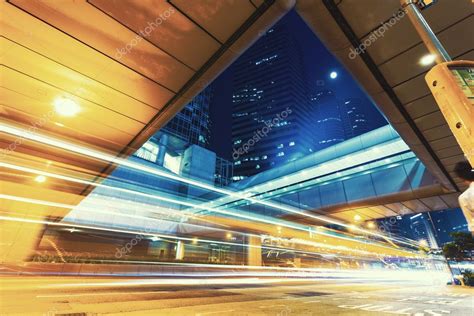 Traffic light trails in modern city — Stock Photo © zhudifeng #64513097