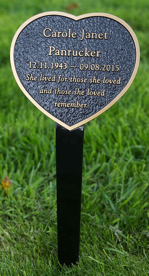 This beautiful bronze memorial plaque has a tree stake attached. It is ...