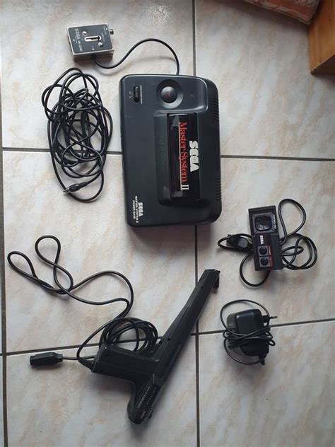 1 Sega master system II - Console with games - Without - Catawiki