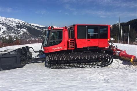 Pistenbully 300 snow groomer with 20-person cabin