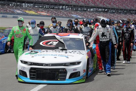 PHOTOS: NASCAR drivers come together to support Bubba Wallace before Talladega