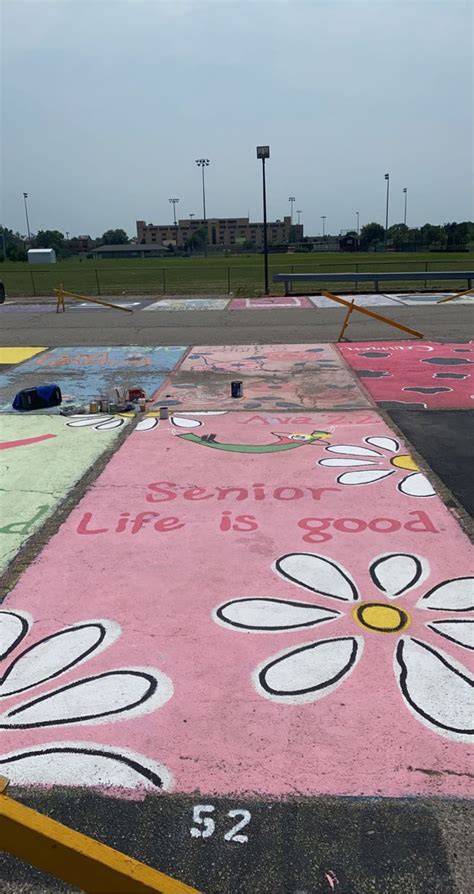 the parking lot has been painted with flowers