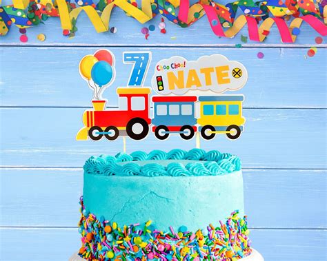 "This colorful personalized train cake topper is perfect for your train ...