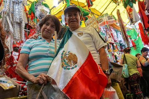 Mexican Couple Shops for Independence Day Decorations