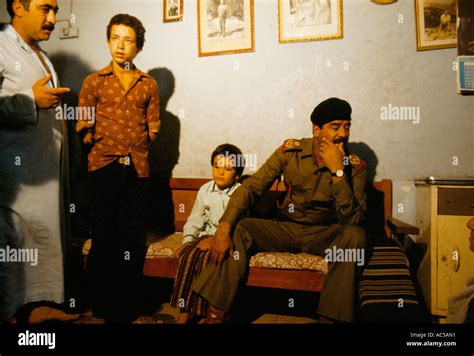 SADDAM HUSSEIN SADDAM HUSSEIN SEATED WITH FAMILY IN THEIR HOME Stock Photo, Royalty Free Image ...