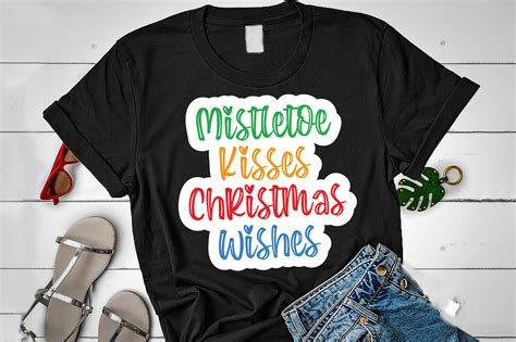 Mistletoe Kisses Christmas Wishes Graphic by Tshirt4Pod · Creative Fabrica