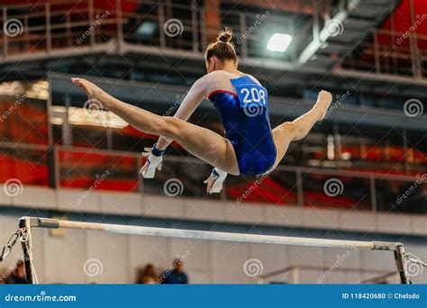 Women Gymnast Exercises on Uneven Bars Editorial Image - Image of ...