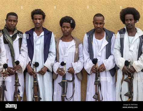 Beja tribe warriors with their swords, Red Sea State, Port Sudan, Sudan Stock Photo - Alamy