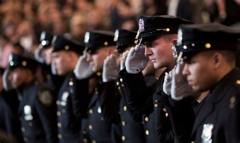 The newest members of the New York City Police Department (NYPD) salute ...