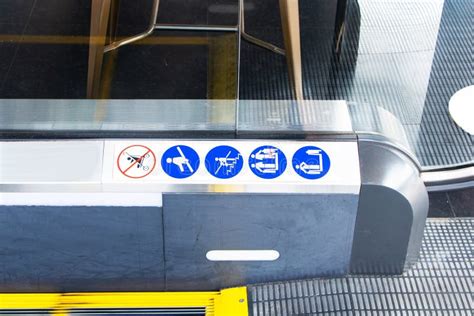 Signs on an Escalator, Warning Signs, Escalator at Shopping Mall or ...