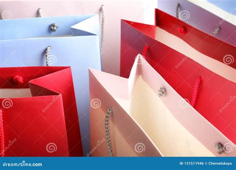 Colorful Paper Shopping Bags As Background Stock Photo - Image of bargain, fashion: 131511946