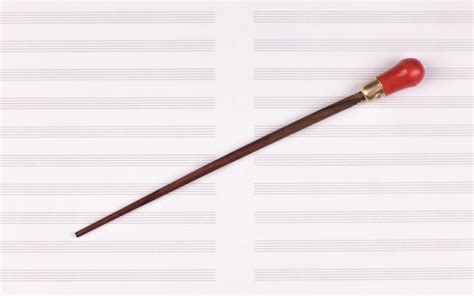 Premium Photo | Conductor stick and sheet music