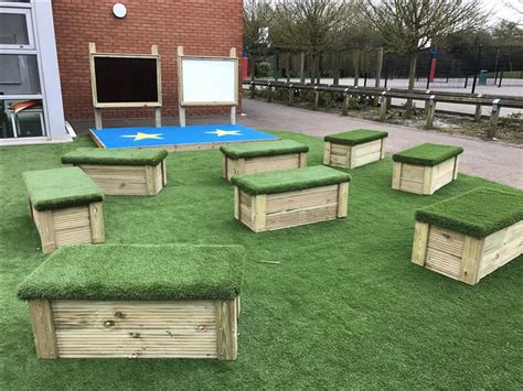 Artificial Grass Topped Playground Seating | Pentagon Play