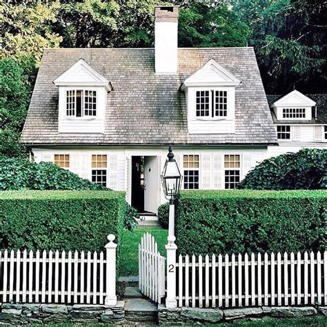 White cottage + white picket fence | House exterior, Cottage homes, Cottage style