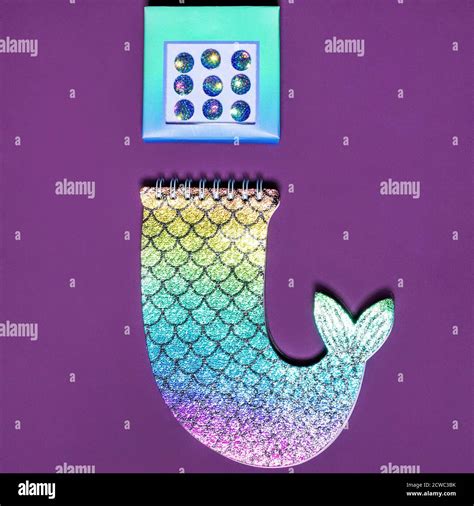 Colorful shiny paper notebook isolated top view Stock Photo - Alamy