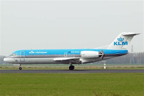 Fokker 70 (F-28-0070) KLM Cityhopper PH-WXA Amsterdam Schiphol April_21_2006 - PlaneWatcher