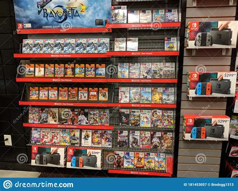 Nintendo Switch, Bayonetta 2, and Other Video Game Merchandise on Display Editorial Photography ...