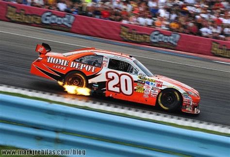 Can someone explain why flames come out of the exhaust pipes? : NASCAR