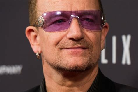 U2's Bono says he might never be able to play guitar again after hurting his elbow in a bike ...