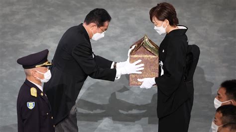 Japan's former leader Abe honored at a divisive state funeral : NPR