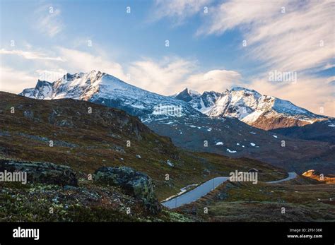 Mountain road through mountain scenery Stock Photo - Alamy