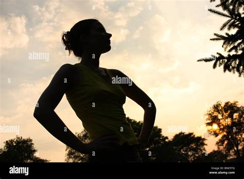 girl posing sunset shadow silhouette Stock Photo - Alamy