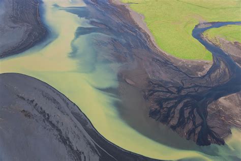 Aerial View Of River Estuary Or Delta Photograph by Peter Adams - Pixels