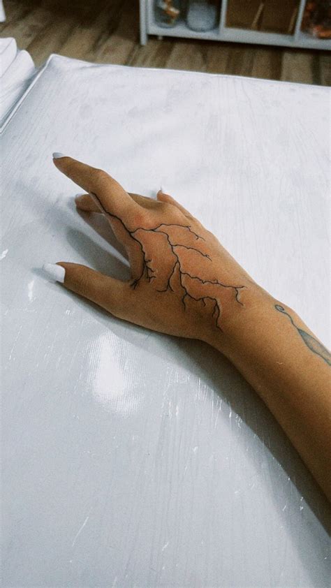 lightning tattoo | Hand tattoos for guys, Lightening tattoo, Lightning ...