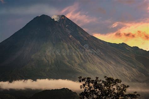 Magnificent MERAPI Volcano with Fog and Sunrise Sky Background Stock Photo - Image of dome ...