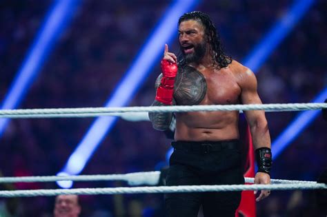 WWE: Roman Reigns retains Summerslam title as Jimmy Uso turns on ...