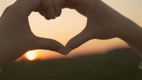 Girl Making Heart Shape With Hands In Front Stock Footage SBV-316931509 ...