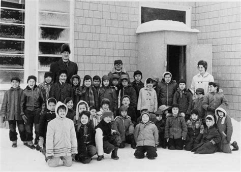 Photograph of clergy, teacher, and students | Algoma University Archives