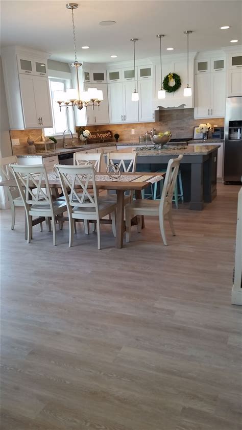 Coretec- Ivory Coast in Model Home | Kitchen flooring, Condo kitchen ...