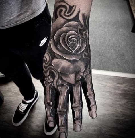 The Art of Ink: The Rose Skeleton Hand Tattoo | Art and Design