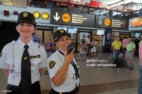 Comodoro Arturo Merino BenÍtez International Airport, woman security ...