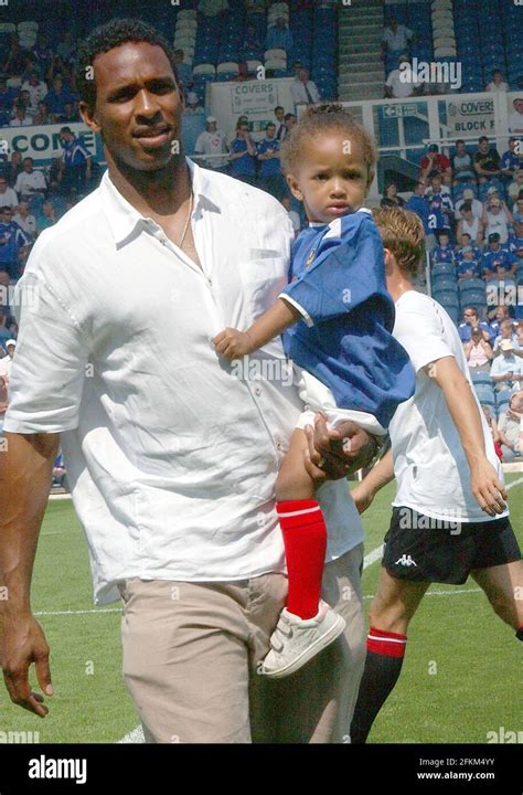 Portsmouth goalkeeper shaka hislop and daughter. pic mike walker, 2003 Stock Photo - Alamy